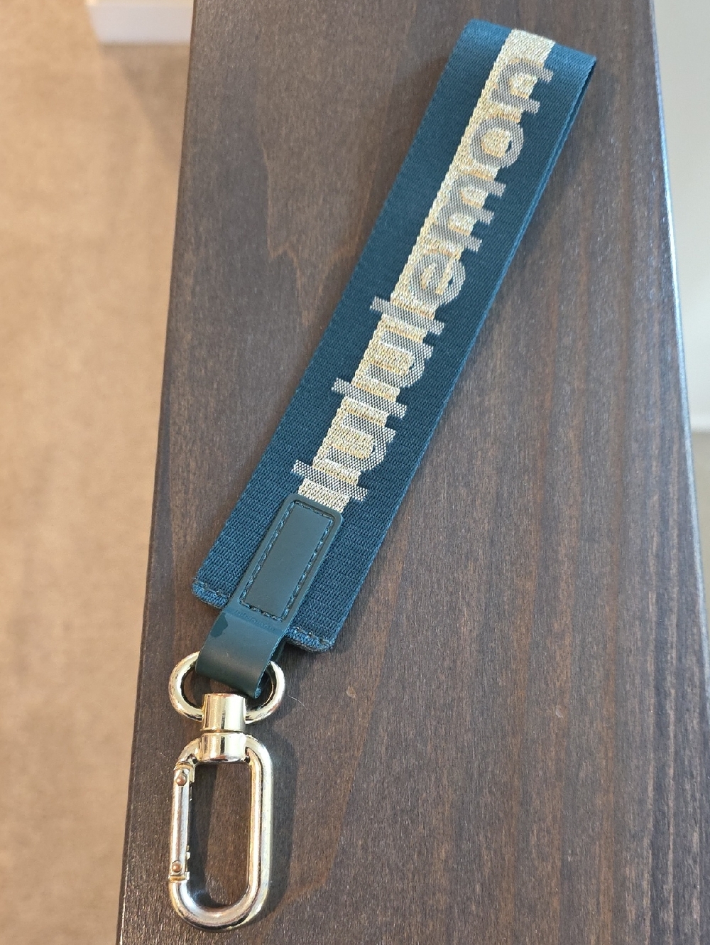 Lululemon Forest Green And Gold Strap Keychain with Gold Hardware